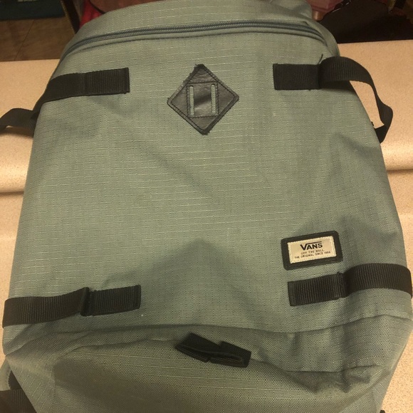 vans army green backpack